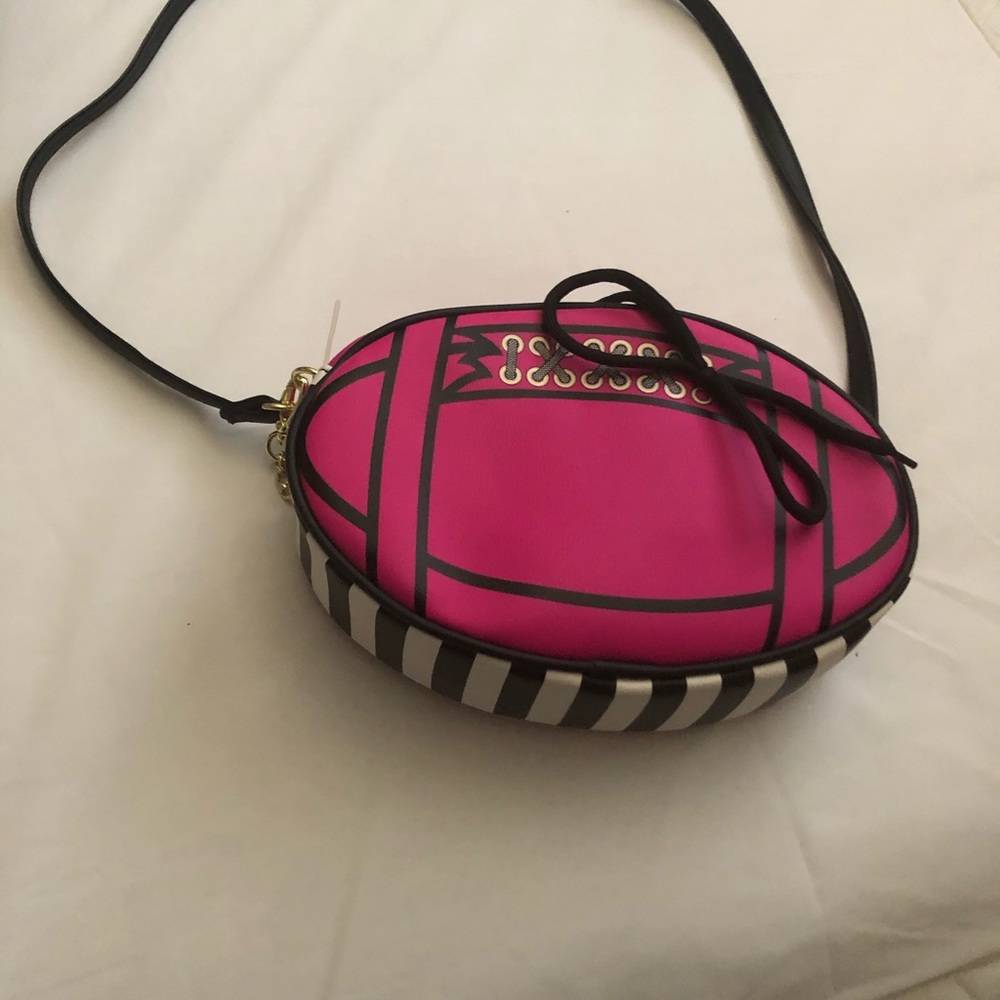 Betsy Johnson Pink football shaped crossbody bag